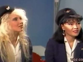 Three magnificent flight stewardess in one scene