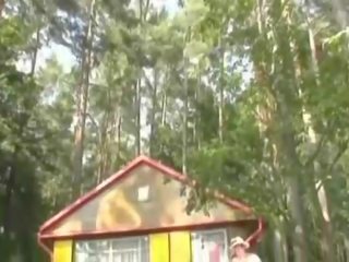 Oversexed granny sucking old penis in the forest