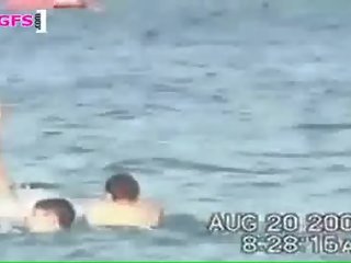 Gabriella fucks a bloke in the water
